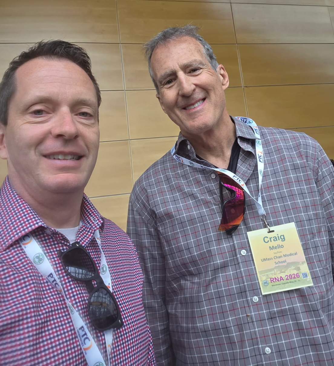 Two men at a conference
