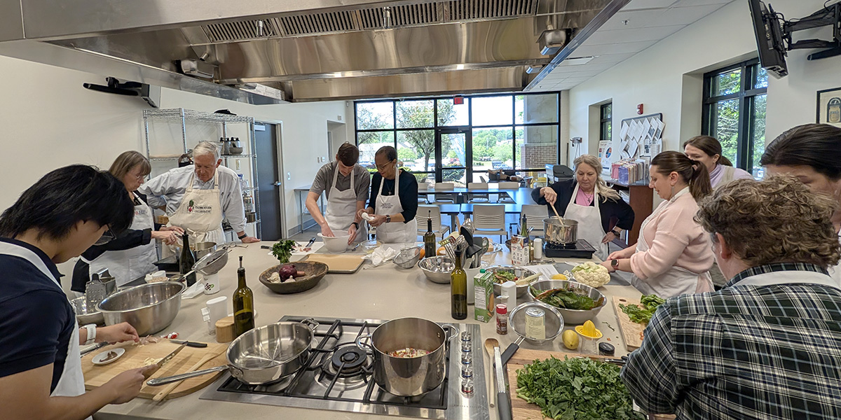 Business Office staff participate in team-building cooking class