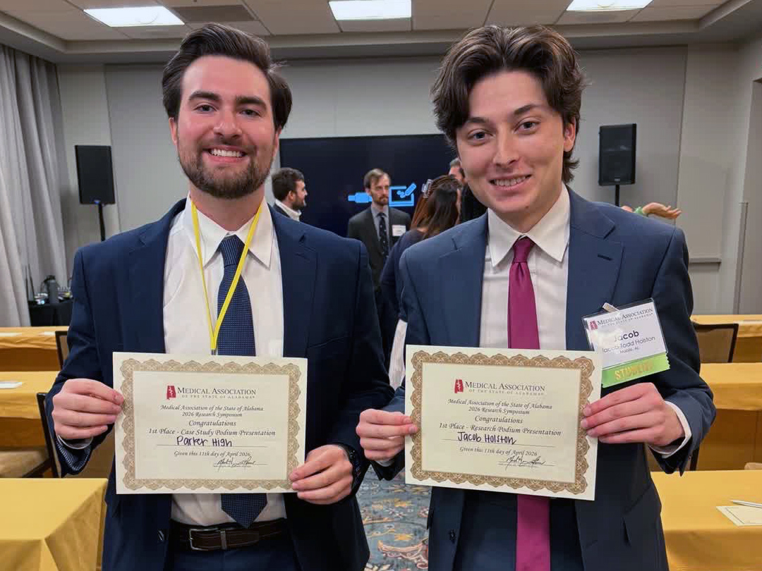 Jacob Holston with award certificate