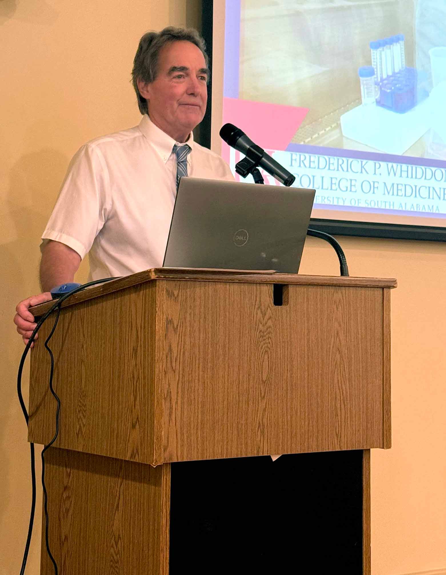 Dr. Richard Honkanen speaks at podium