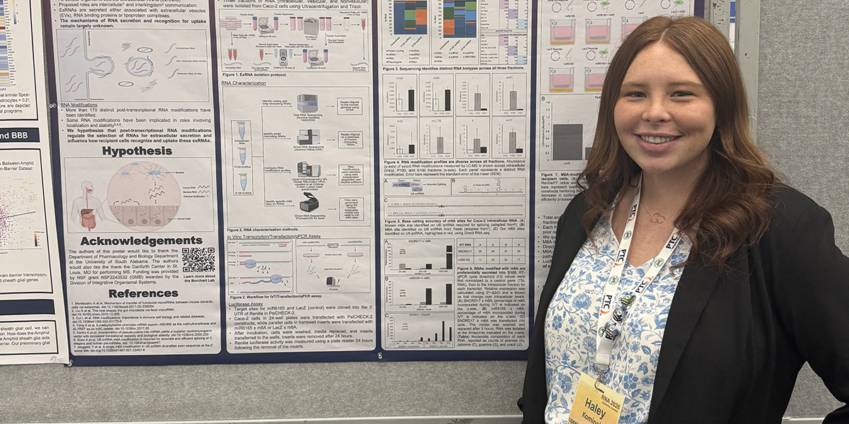 Student presents poster at conference data-lightbox='featured'