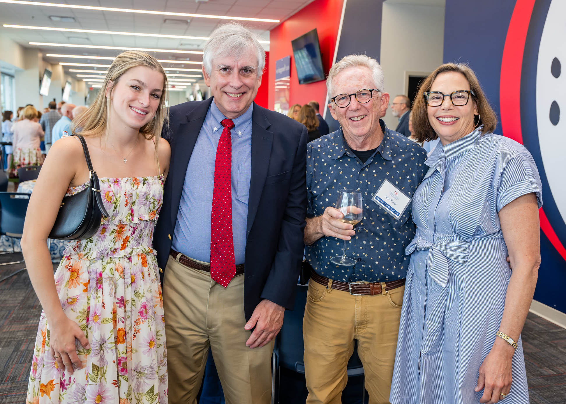 Two men and two women at a reception