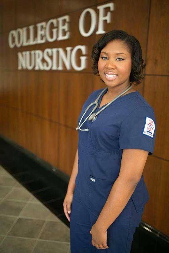 USA Nursing Student standing in College of Nursing.