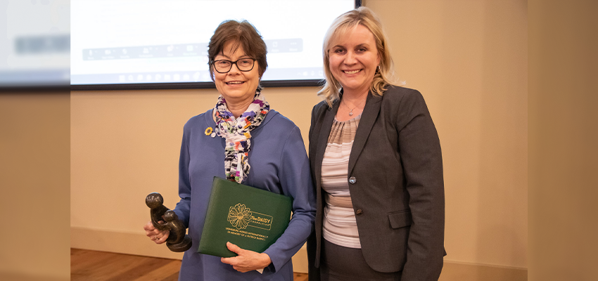 Dr. Brenda Woodmansee with Dr. Heather Hall receiving the DAISY Award for Extraordinary Nursing Faculty. data-lightbox='featured'