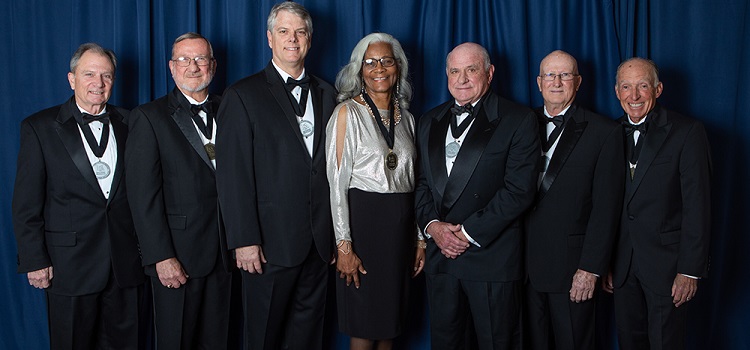 The USA National Alumni Association honored alumni and supporters at the 16th annual Distinguished Alumni & Service Awards. Those recognized were, from left, William J. “Happy” Fulford III, Dr. Joseph F. Busta Jr., Brian J. Cuccias, Merceria Ludgood, John T. Crowder Jr., William B. Burnsed Jr. and James J. “Jake” Gosa.