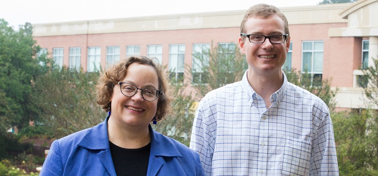 Dr. Leavesley, Scholar of the Year, pictured with Artist of the Year, Dr. Moore