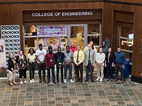 ECE Department Hosts Edge AI Summer Program attendees and faculty take a group picture in the Shelby Hall atrium. data-lightbox='featured'