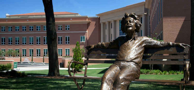 Einstein statue on bench in front of Meisler Hall data-lightbox='featured'