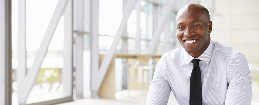 Man in tie smiling