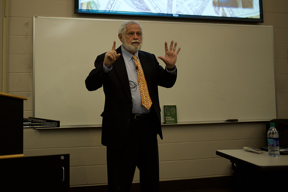 Aaron Beam speaking to students about corporate ethics. 