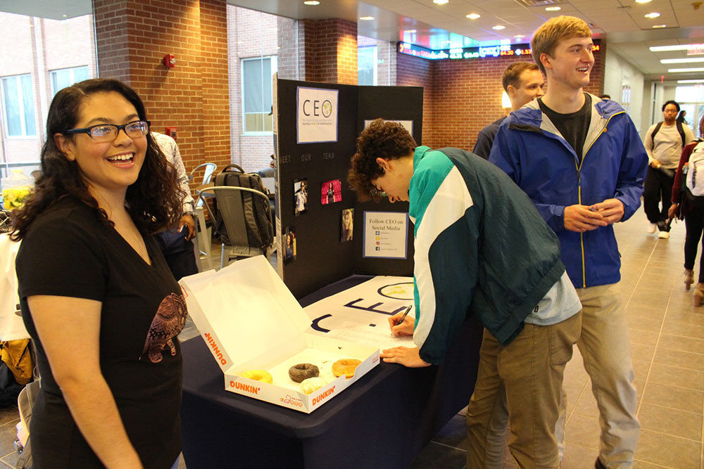 CEO selling donuts to students