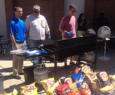 Grilling hot dogs at MCOB Grilling hot dogs at MCOB