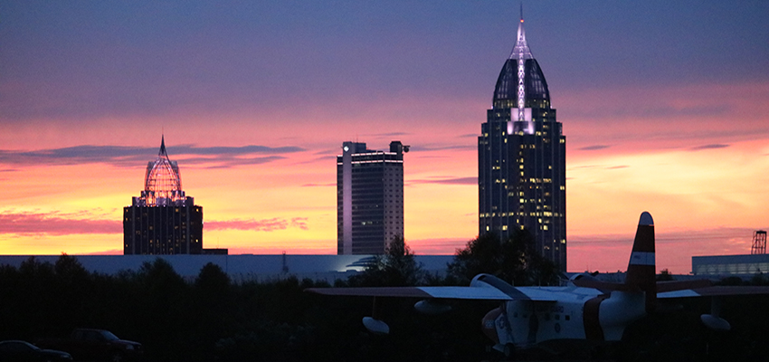 Downtown Mobile Skyline with Plane