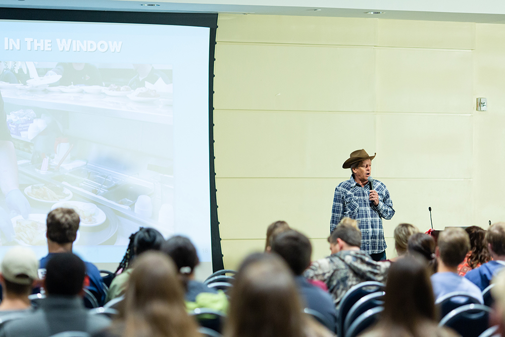 Kent Taylor, CEO and Chairman of Texas Roadhouse speaks to students at ELS event.