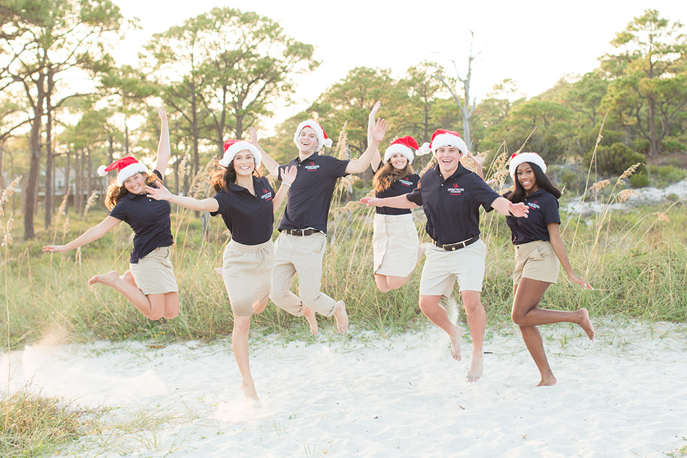 Mitchell Ambassadors taking a jump group photo.