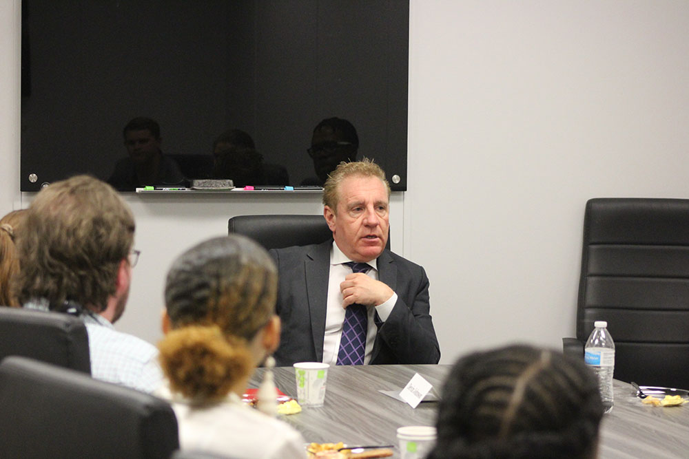 Marco Provvidera speaking to students at breakfast.