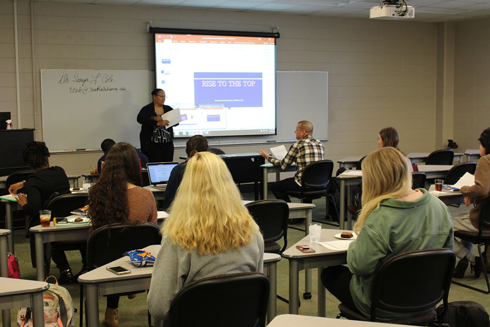 Dr. Cole helping students with resumes