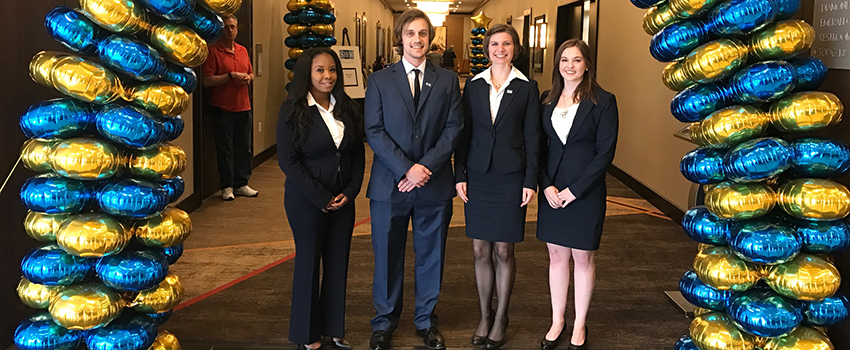 Students left to right are Brittany Haines, Brandon Dettwiller, Emma Fairbanks, and Morgan Byrd.