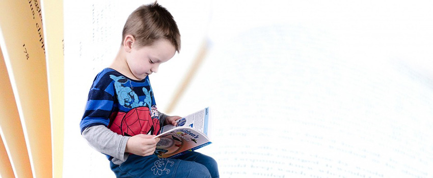 Child reading a book