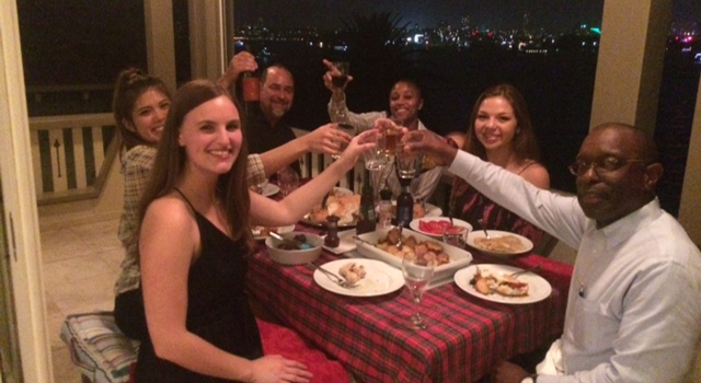 Class dining on the balcony of her home overlooking Sydney Harbour