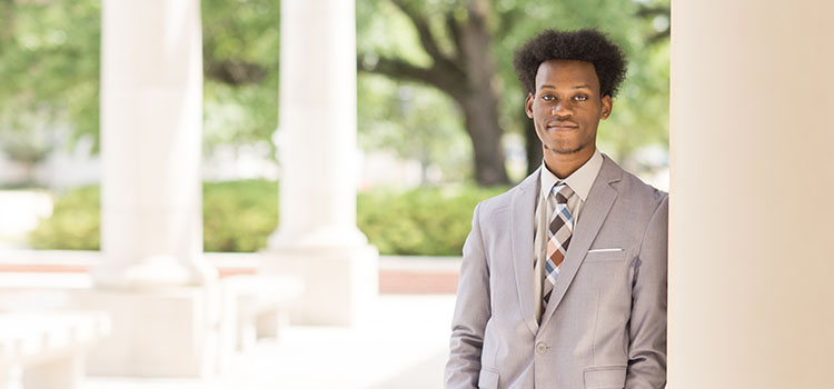 Ronald Blanks standing outside on campus.