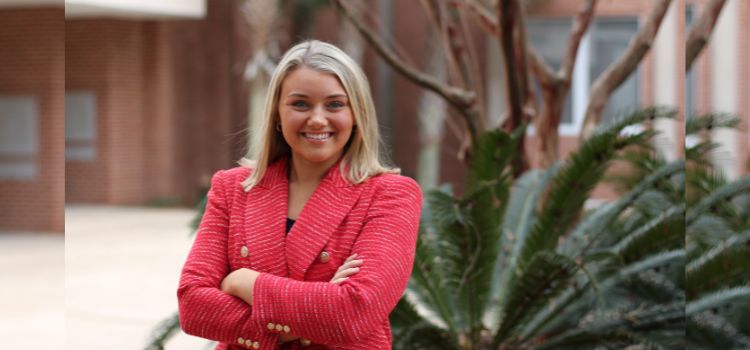 Anne Morgan Swearingen standing outside on campus.