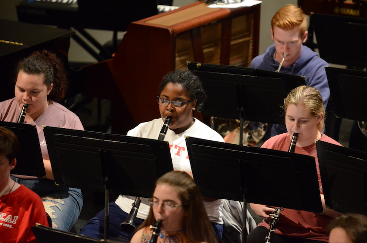 Pictured is a section of the USA Symphony Band in rehearsal. data-lightbox='featured'