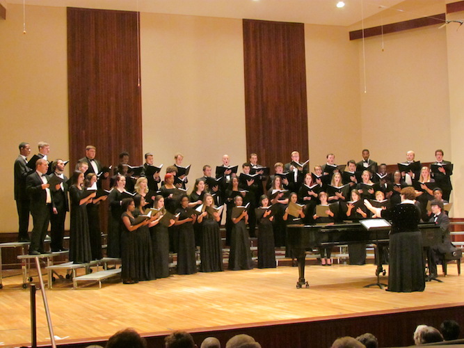 USA Concert Choir pictured on stage in the Laidlaw Recital Hall during a previous performance.