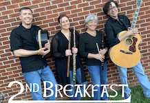 Pictured against a brick wall are members of the 2nd Breakfast Celtic Band.