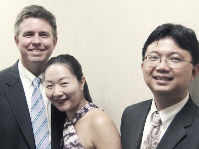 Archduke Piano Trio (violinist Enen Yu, cellist Guo-Sheng Huang and pianist Robert Holm) pictured with happy expressions