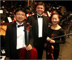 the Archduke Piano Trio, consisting of Steinway Artist and USA Professor of Piano Dr. Robert Holm, violinist Enen Yu and cellist Dr. Guo-Sheng Huang,