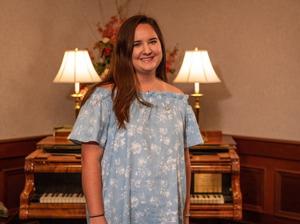 Pictured in the Laidlaw Performing Arts Center Green Room is hornist Emma Brown. data-lightbox='featured'