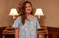 Pictured in the Laidlaw Performing Arts Center Green Room is hornist Emma Brown.