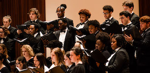 USA's Concert Choir is shown performing on the Laidlaw stage.