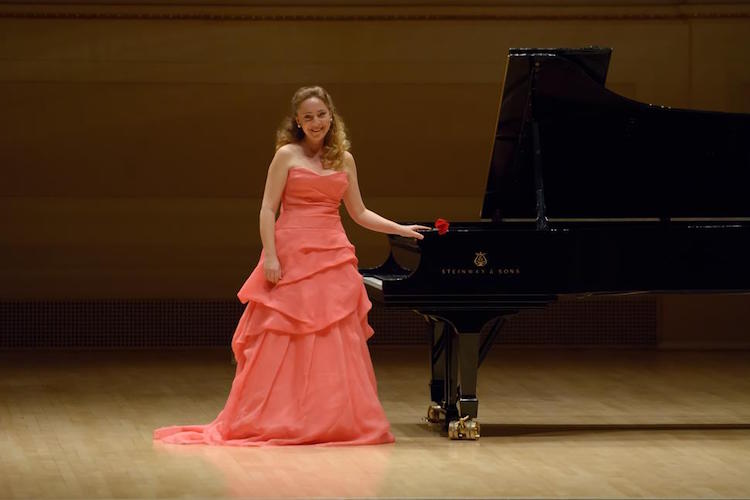 Pictured on stage is piano soloist Katya Grineva