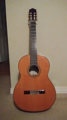 Pictured is a guitar. data-lightbox='featured'