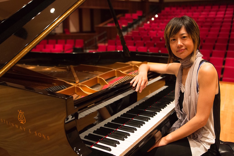 Jasmin Arakawa seated at open Steinway piano 