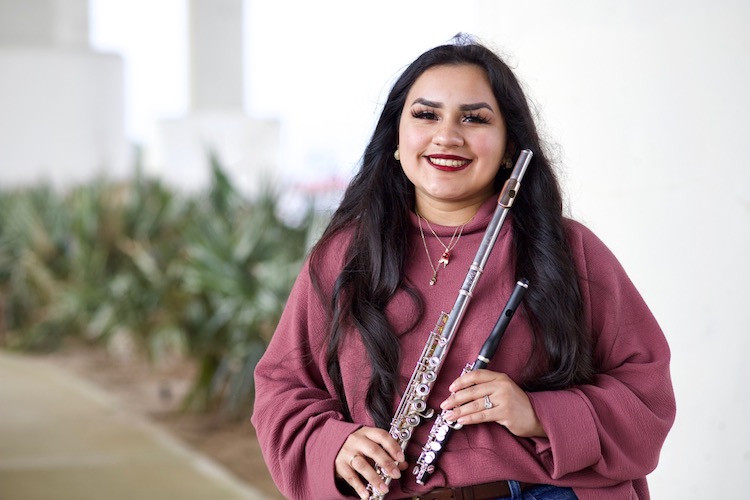 Pictured is flutist Maria Lawrence. data-lightbox='featured'