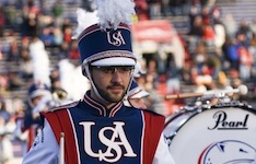 Pictured in uniform with the South Alabama Jaguar Marching Band is recently graduated senior percussionist Jared Messinger.