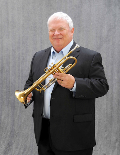 Robert Murray standing with trumpet