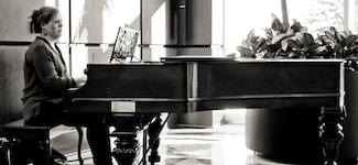 Pictured is Angela Porter, USA faculty pianist.