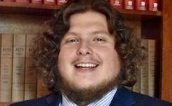 Pictured is senior French horn player William Stoll.