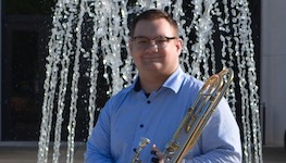 Pictured at the downtown Saenger Theatre is trombonist Cooper Tate.