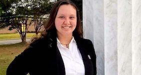 Pictured outdoors on the South Alabama campus is percussionist Sarah Thomas.