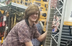 Pictured at a music business conference is senior USA student guitarist Alec Thompson.