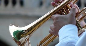 Pictured is a flugelhorn being played anonymously.