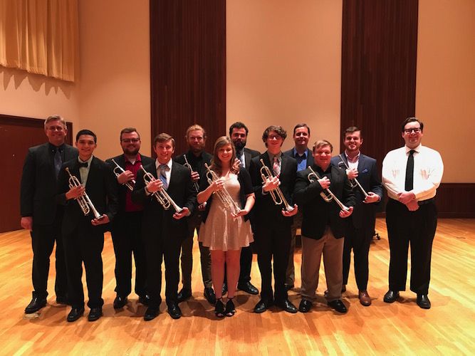Pictured from a past performance are the students and teacher of the USA Trumpet Studio. data-lightbox='featured'