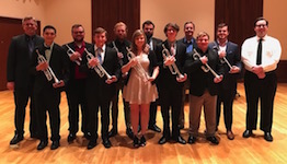 Pictured from a past performance are the students and teacher of the USA Trumpet Studio.