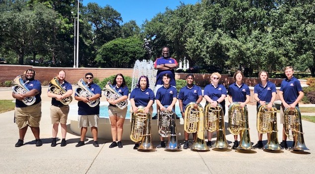 Pictured outside of the Laidlaw Performing Arts Center are members of the USA Tuba-Euphonium Ensemble. data-lightbox='featured'