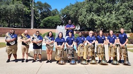 Pictured outside of the Laidlaw Performing Arts Center are members of the USA Tuba-Euphonium Ensemble.